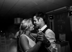 A Bride & Groom having their first dance at their wedding recepetion.